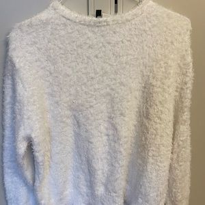 This is a fuzzy sweater from H&M. It is an L size and only wore twice.